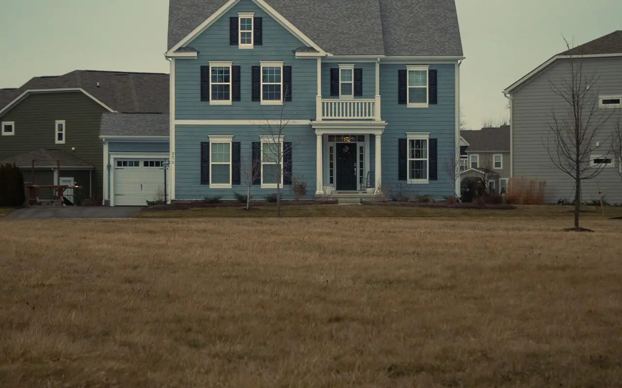 Colonial-style home with an attached garage