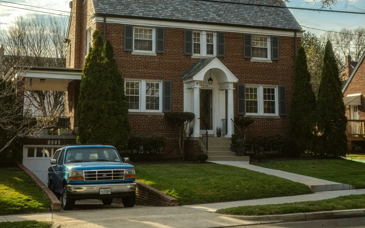 Brick colonial home with an attached garage